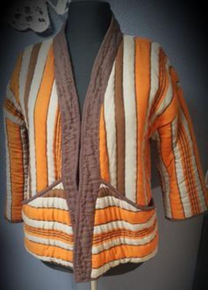 Стеганная  и Вязаная симфония в одежде - photo 2